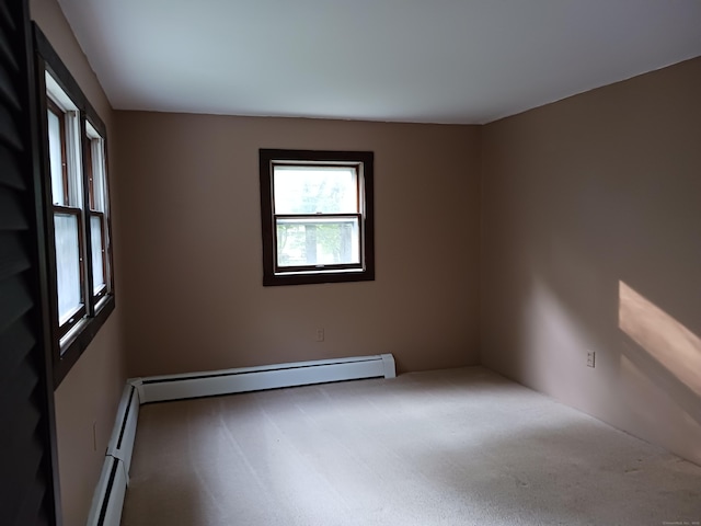 153 Bozrah St, Bozrah, CT 06334 - spare room with carpet and a baseboard radiator