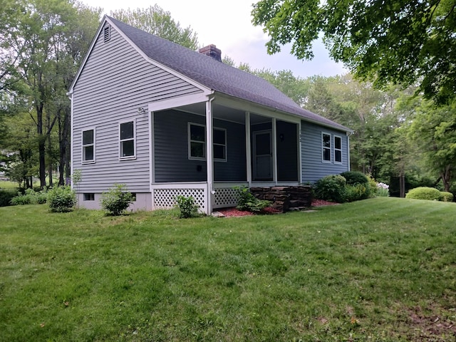 153 Bozrah St, Bozrah, CT 06334 - rear view of property featuring a chimney, a yard, and a shingled roof