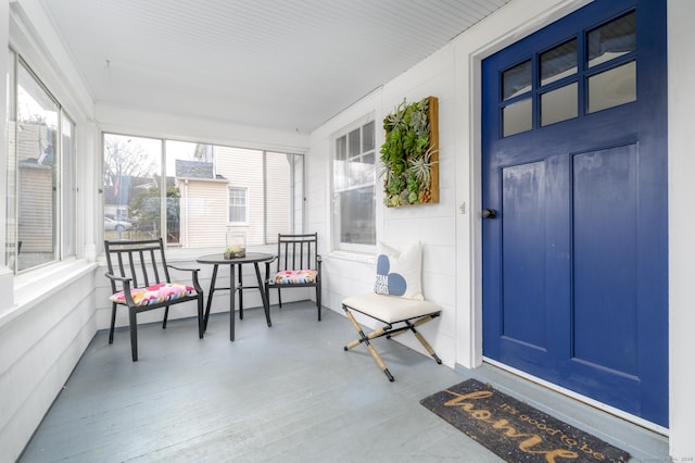 doorway to property with covered porch