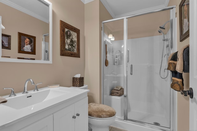 bathroom with ornamental molding, a stall shower, vanity, and toilet