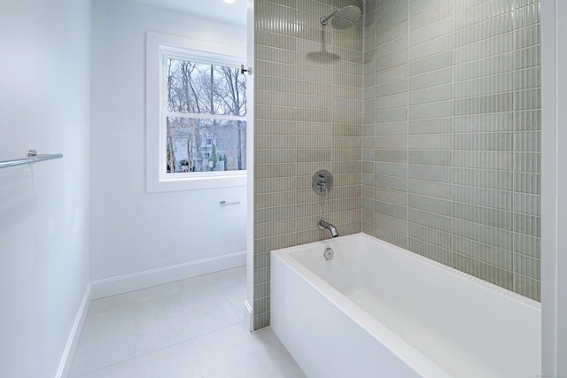 full bathroom featuring  shower combination, tile patterned flooring, and baseboards