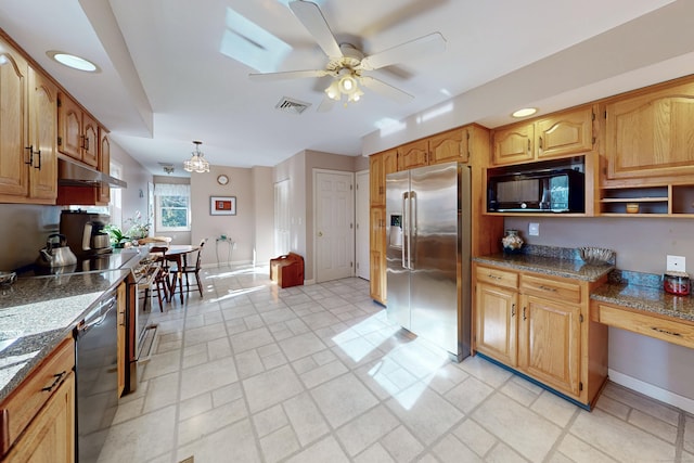 kitchen featuring black microwave, dishwashing machine, baseboards, built in study area, and stainless steel fridge with ice dispenser