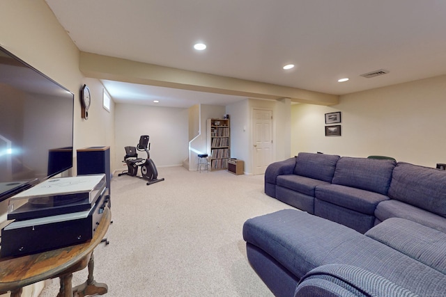 carpeted living area with baseboards, visible vents, and recessed lighting