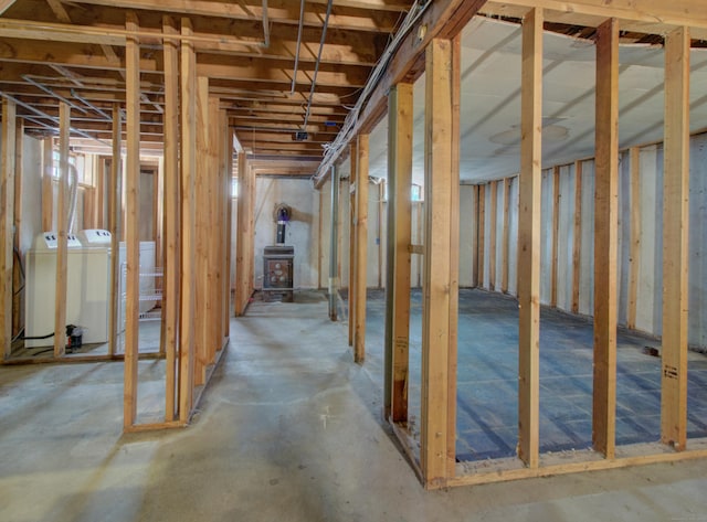 unfinished basement featuring washer and dryer