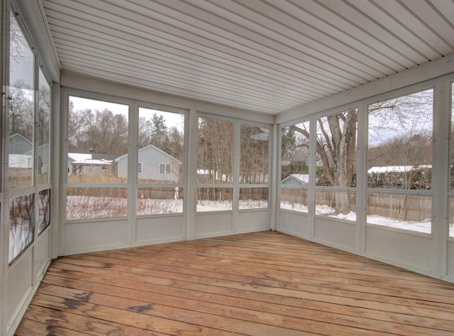 unfurnished sunroom featuring plenty of natural light