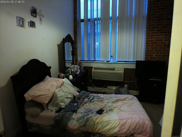 390 Charles St Apt 216, Bridgeport, CT 06606 - bedroom with a wall unit AC