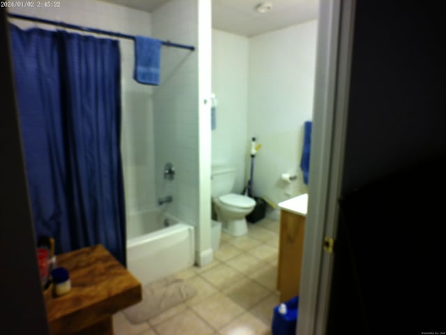 390 Charles St Apt 216, Bridgeport, CT 06606 - bathroom featuring toilet, tile patterned flooring, shower / bathtub combination with curtain, and vanity