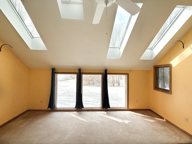 bonus room featuring baseboards, carpet floors, and lofted ceiling