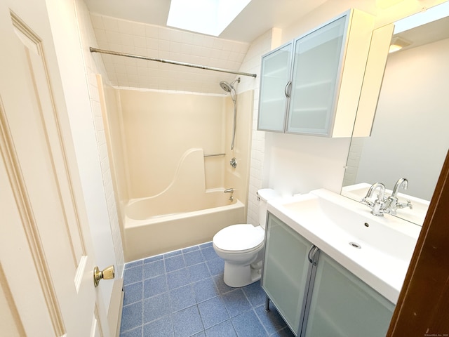 full bath with vanity, tile patterned floors, toilet, and tub / shower combination