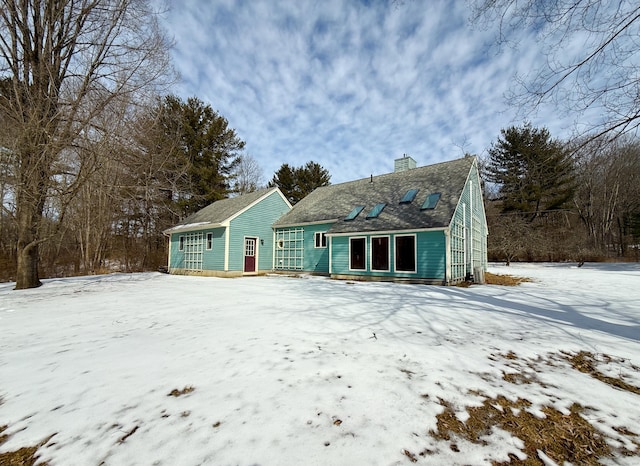 view of front of property featuring a chimney