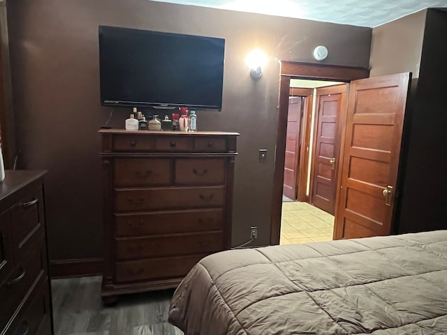 bedroom with light wood-type flooring