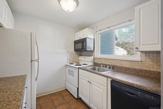 kitchen featuring a sink, backsplash, black appliances, and white cabinets