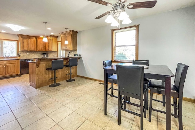 dining room featuring light tile patterned floors, recessed lighting, a ceiling fan, and baseboards