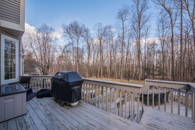 wooden deck with area for grilling