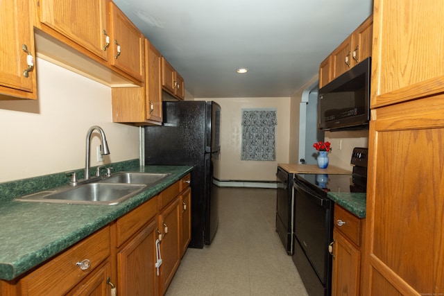 kitchen featuring a sink, black appliances, and brown cabinetry