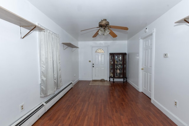 foyer entrance featuring a baseboard radiator, baseboards, wood finished floors, and a ceiling fan