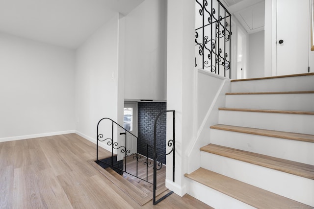 26 Ranchwood Dr, West Haven, CT 06516 - stairs with attic access, wood finished floors, and baseboards