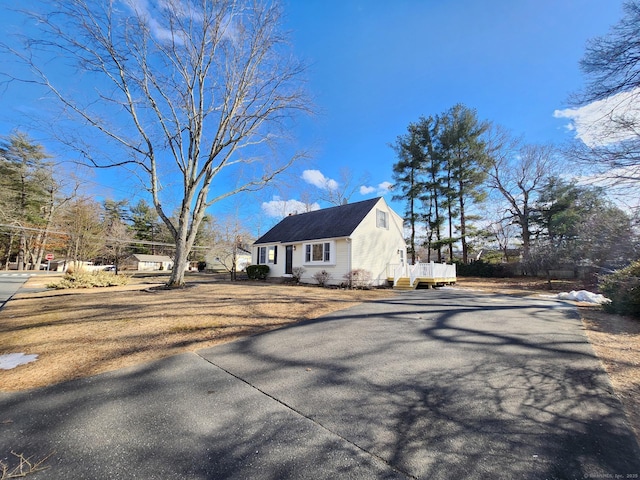 view of home's exterior featuring a deck