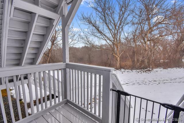 view of snow covered deck