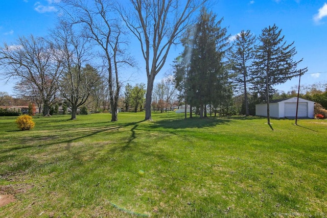 9 Waters Ave, Rocky Hill, CT 06067 - view of yard featuring an outbuilding and a garage