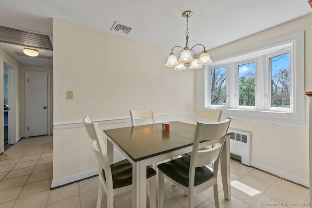 9 Waters Ave, Rocky Hill, CT 06067 - dining room with radiator, visible vents, baseboards, and light tile patterned floors