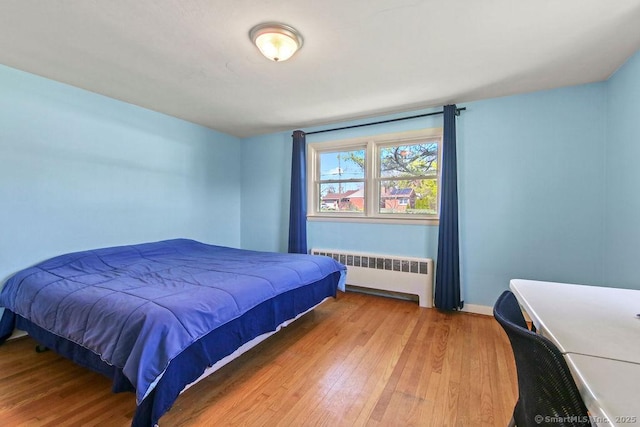 9 Waters Ave, Rocky Hill, CT 06067 - bedroom with radiator and wood finished floors