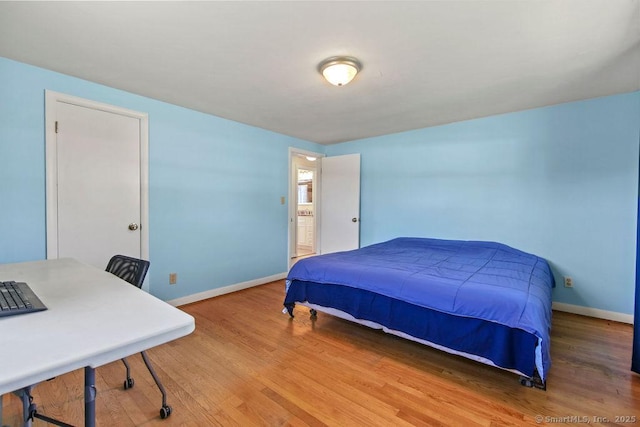 9 Waters Ave, Rocky Hill, CT 06067 - bedroom featuring baseboards and wood finished floors