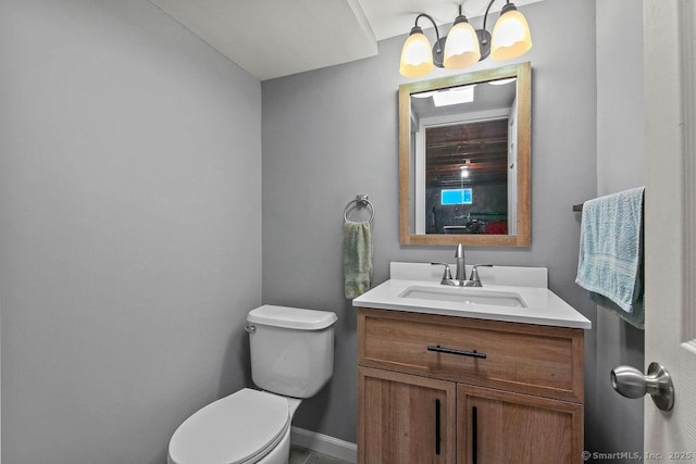 9 Waters Ave, Rocky Hill, CT 06067 - half bathroom with baseboards, toilet, and vanity