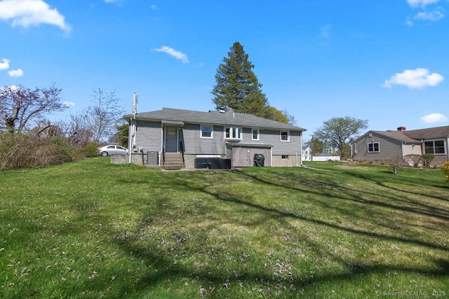 9 Waters Ave, Rocky Hill, CT 06067 - rear view of property with entry steps and a lawn