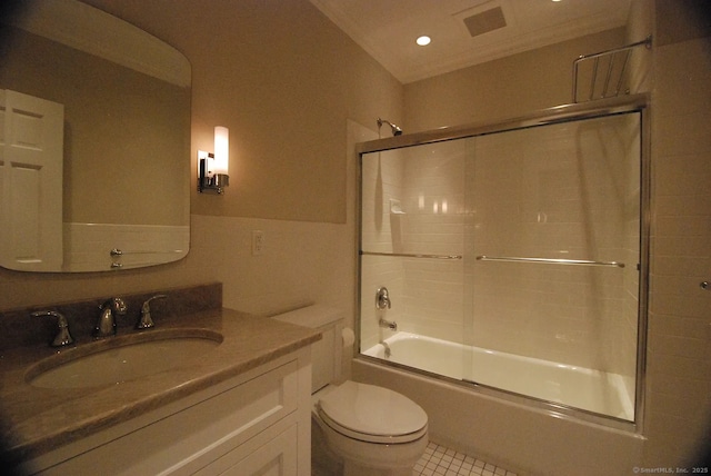 full bathroom featuring tile patterned floors, visible vents, toilet, enclosed tub / shower combo, and vanity