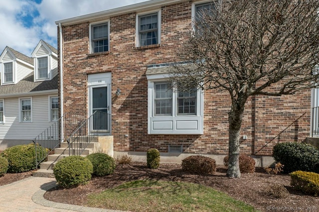 view of front facade with brick siding