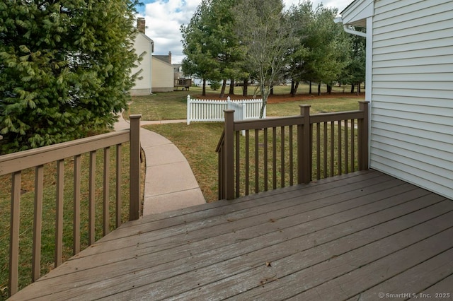 deck featuring a yard