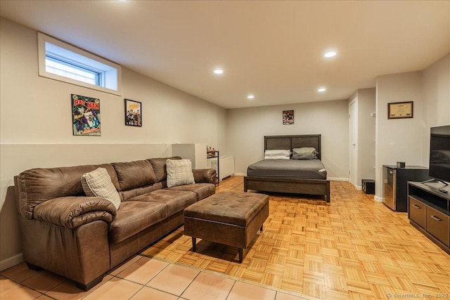 living area with recessed lighting and baseboards