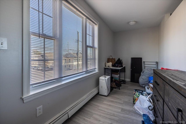 interior space with a baseboard radiator