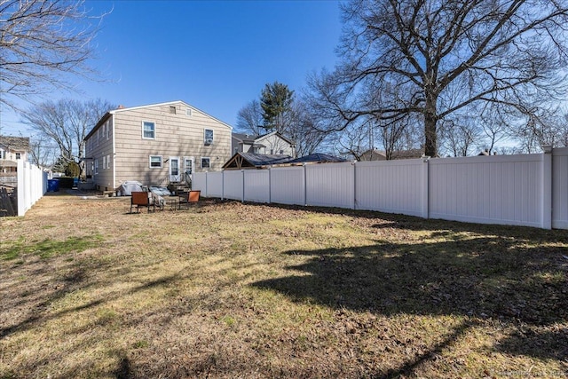 view of yard featuring a fenced backyard