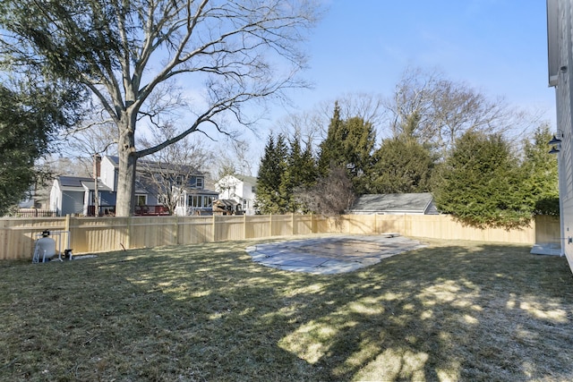 view of yard with a fenced backyard