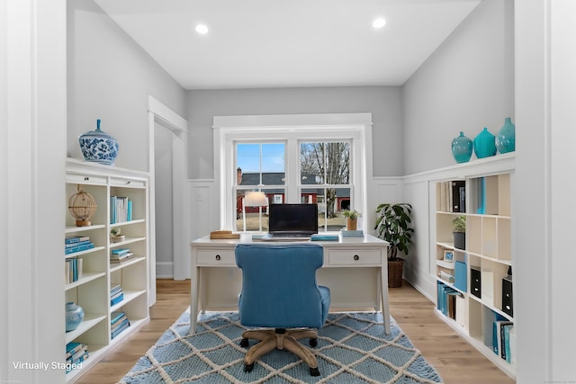 office area featuring recessed lighting, a wainscoted wall, a decorative wall, and light wood-style flooring