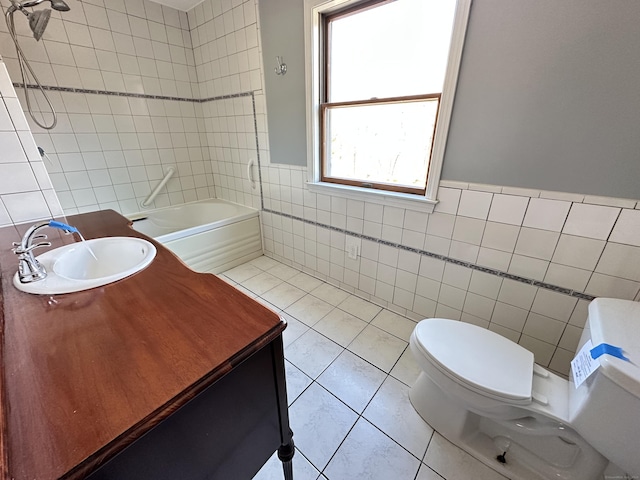 bathroom with shower / bath combination, toilet, tile patterned flooring, vanity, and tile walls