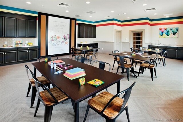 dining area with visible vents and recessed lighting