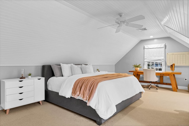 bedroom featuring lofted ceiling, light colored carpet, a ceiling fan, baseboards, and visible vents