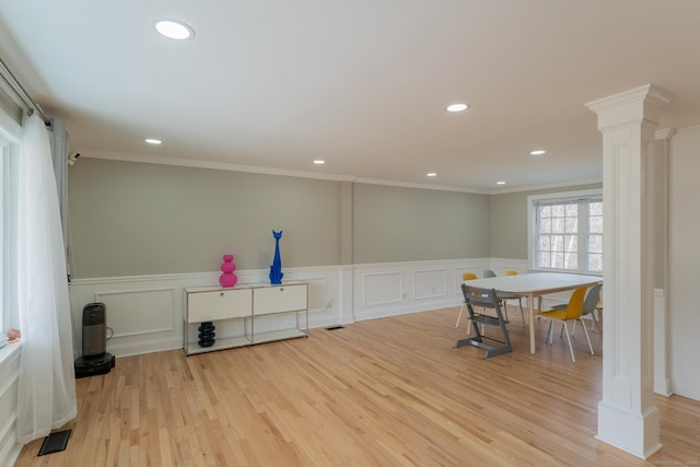 game room with recessed lighting, wood finished floors, ornamental molding, and ornate columns