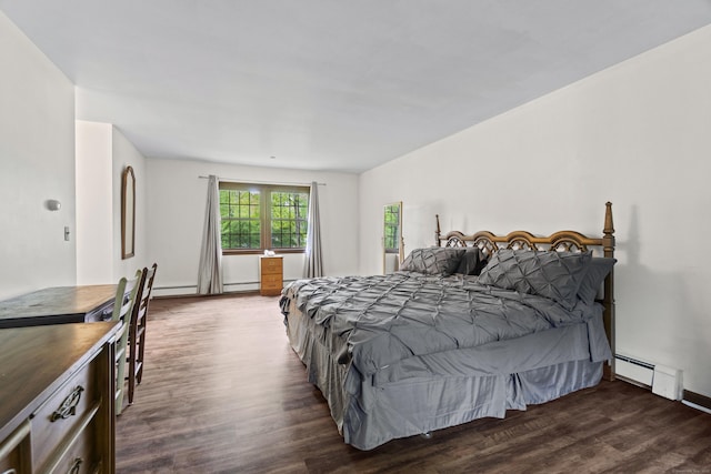 4 Wildwood Ln, Weston, CT 06883 - bedroom featuring wood finished floors, a baseboard radiator, and baseboard heating