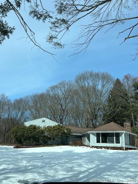 view of snow covered pool