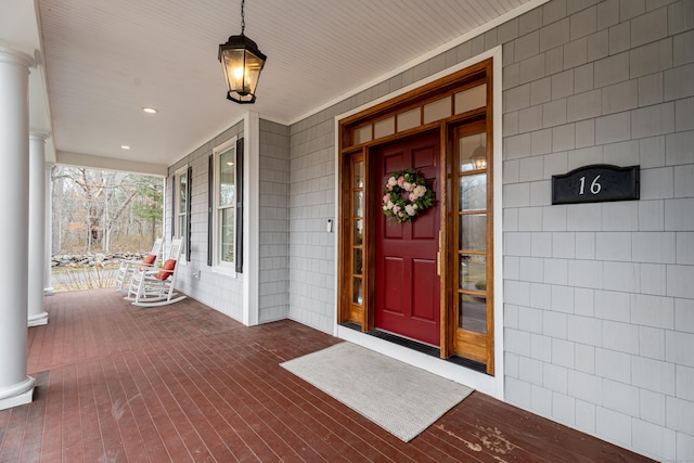 doorway to property featuring a porch