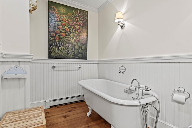 1 Hathaway Rd, East Lyme, CT 06333 - full bathroom featuring baseboard heating, crown molding, a soaking tub, wainscoting, and wood finished floors