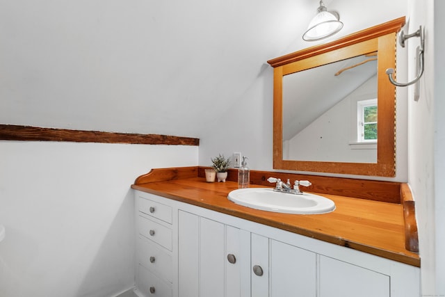 1 Hathaway Rd, East Lyme, CT 06333 - bathroom featuring vaulted ceiling and vanity