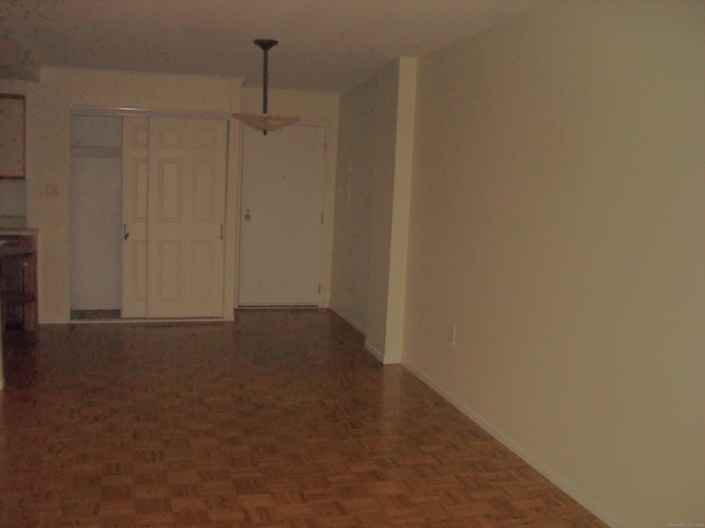 empty room with baseboards