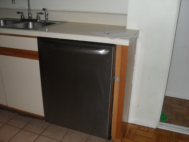 details featuring dishwasher, light countertops, a sink, and baseboards