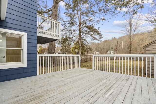 wooden deck featuring fence