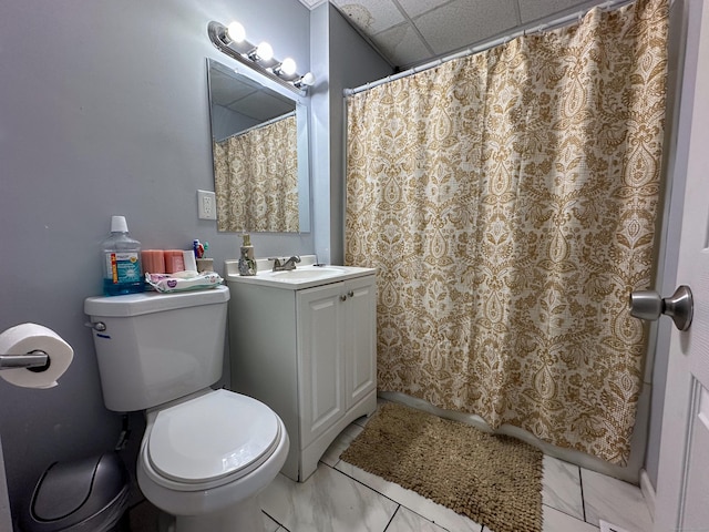 bathroom with a shower with shower curtain, marble finish floor, toilet, and vanity